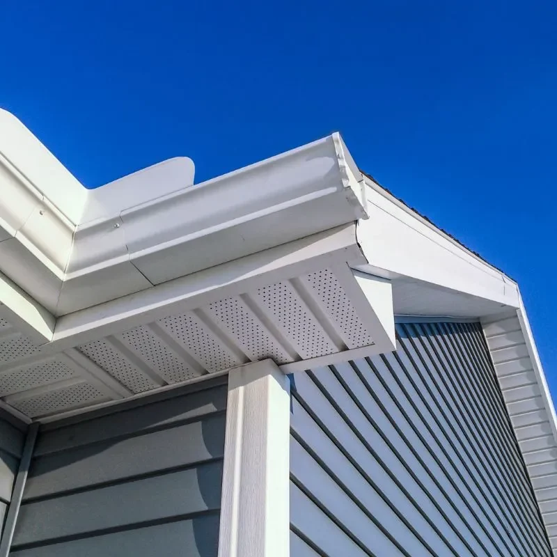 Gray lap siding and white trim on a Calgary home showing hardie board siding cost calgary